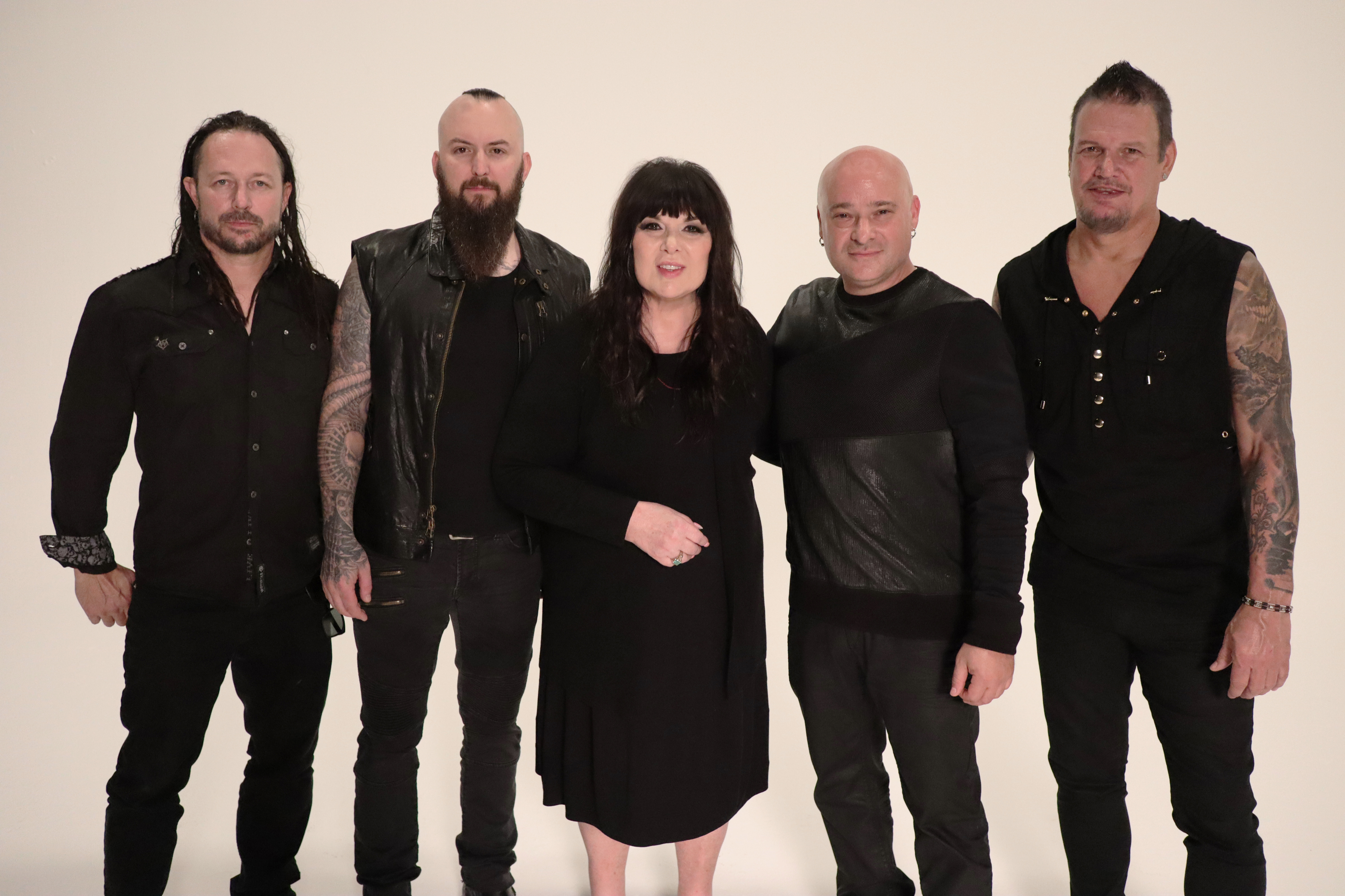 Photo of Disturbed and Ann Wilson of Heart to celebrate their "Don't Tell Me" duet